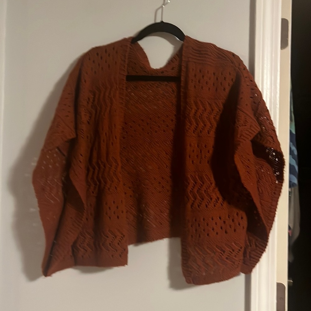 Cute knitted shawl/cardigan.